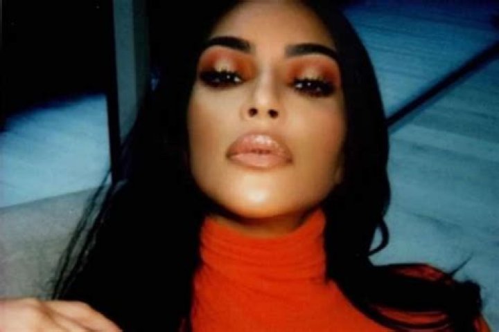 Kim Kardashian West Glows In Orange In New Photos
